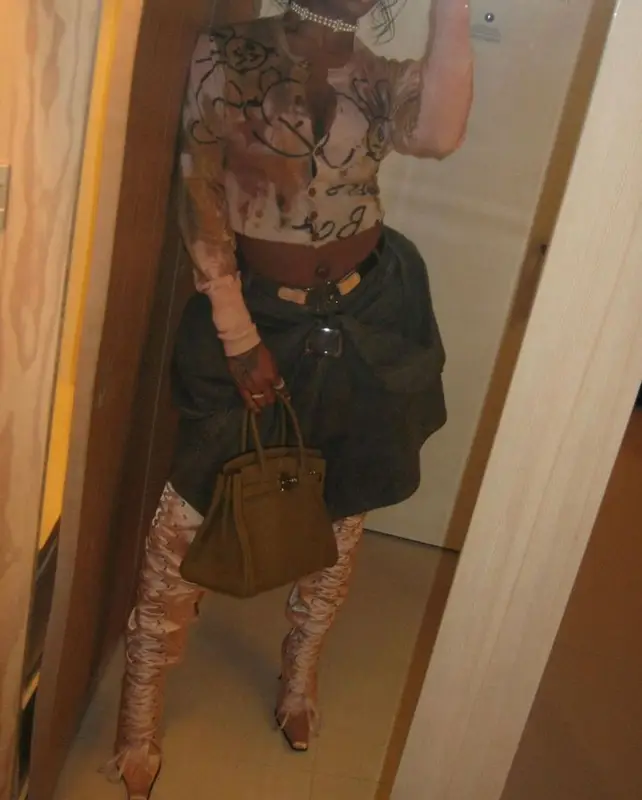 Dess Dior outfit in Vivienne Westwood, Hermes, and Dior, 2023