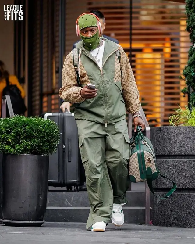 Terry Rozier outfit in Gucci, Jordan, and Apple, 2023