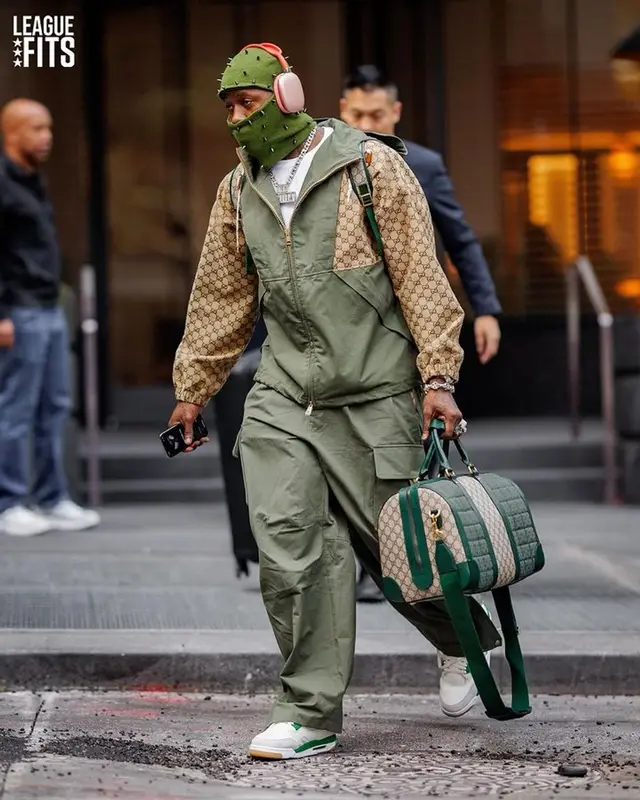 Terry Rozier outfit in Gucci, Jordan, and Apple, 2023