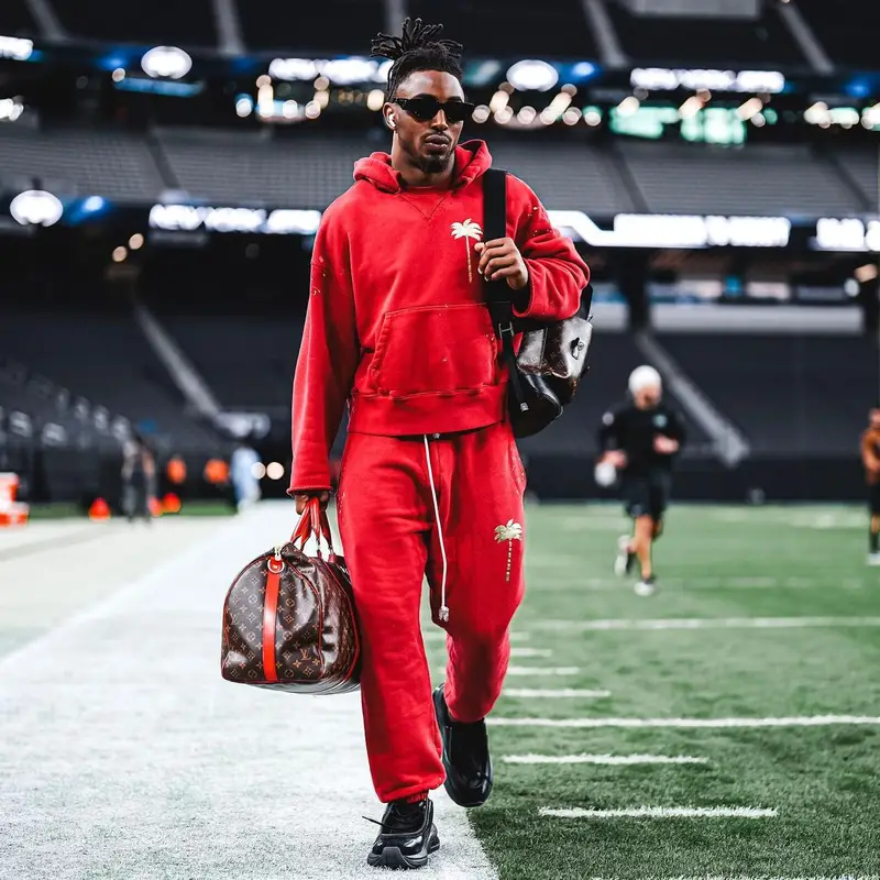 Jordan Whitehead outfit in Palm Angels, Louis Vuitton, and Prada, 2023