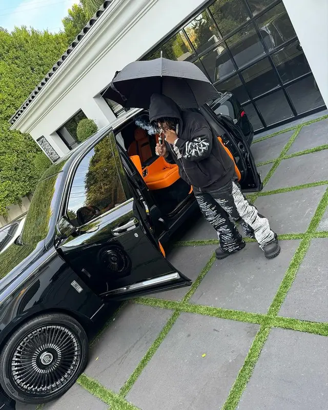 YTB Fatt outfit in Amiri, Louis Vuitton, and Dolce & Gabbana, 2023