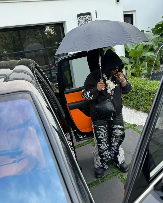 YTB Fatt outfit in Amiri, Louis Vuitton, and Dolce & Gabbana, 2023