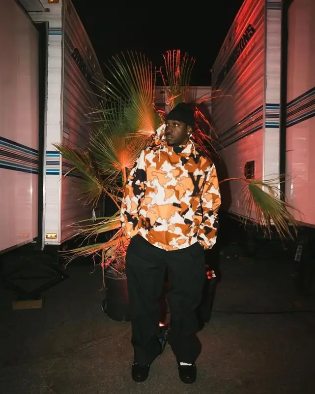 Pusha T outfit in Louis Vuitton and Bottega Veneta, 2023
