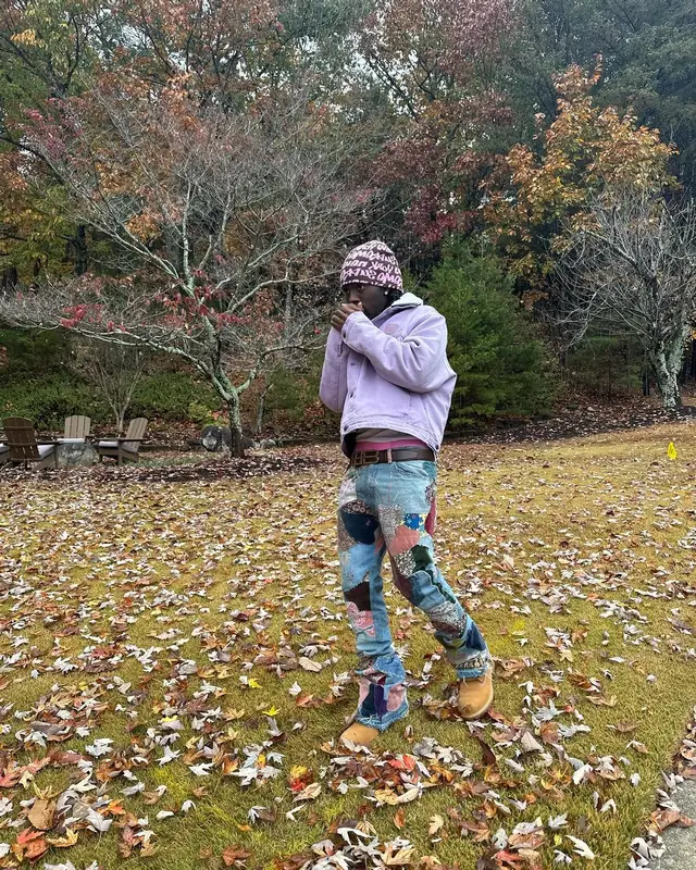 Kai Cenat outfit in Acne Studios, Balenciaga, and Supreme, 2023