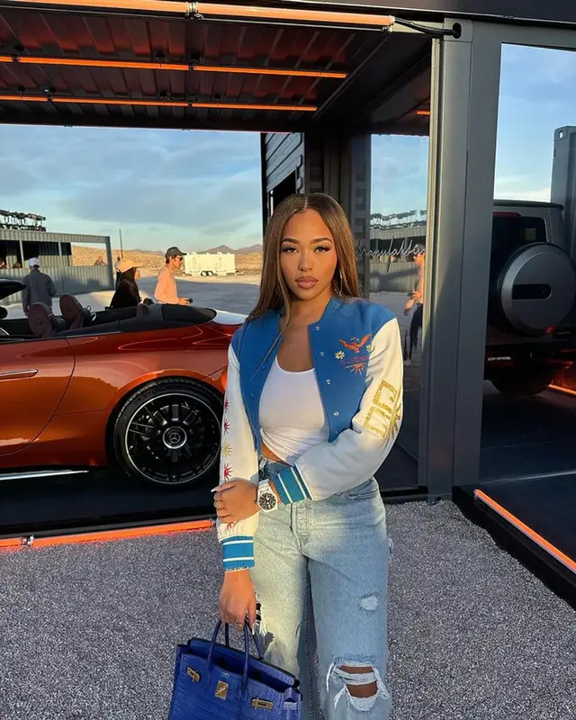 Jordyn Woods outfit in Givenchy, IWC Schaffhausen, and Hermes, 2023