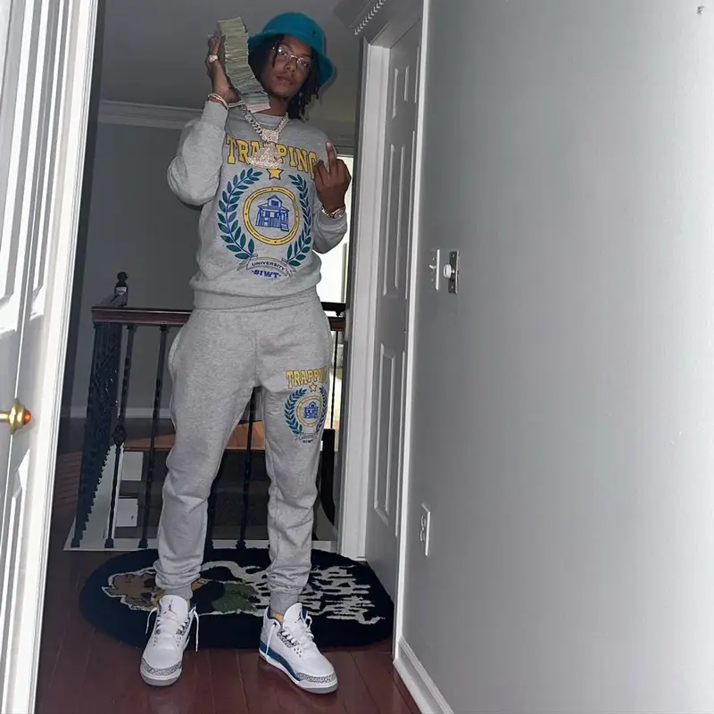 Skilla Baby outfit in Jordan, Cartier, and Kangol, 2023