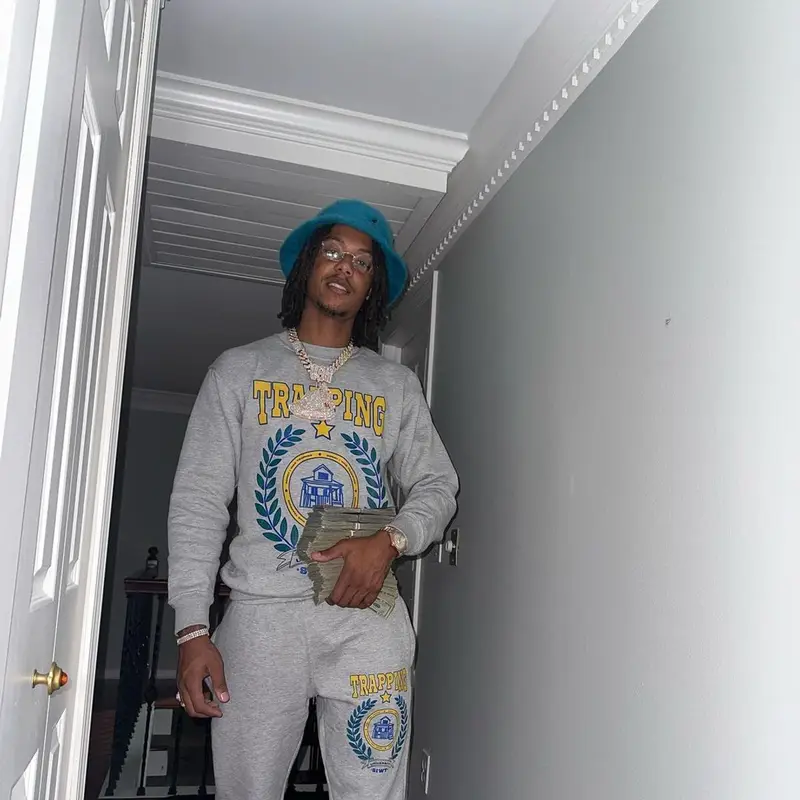 Skilla Baby outfit in Jordan, Cartier, and Kangol, 2023