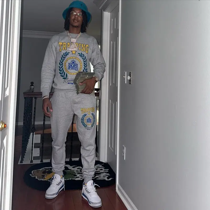 Skilla Baby outfit in Jordan, Cartier, and Kangol, 2023