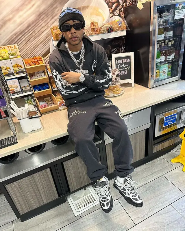 Lil Migo outfit in Hellstar, Louis Vuitton, and Gucci, 2023