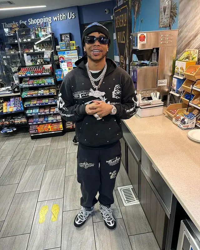 Lil Migo outfit in Hellstar, Louis Vuitton, and Gucci, 2023