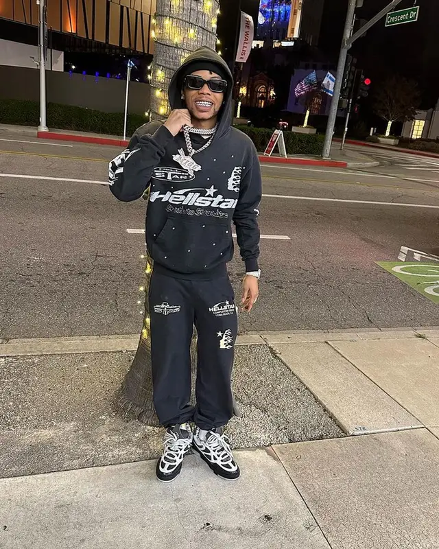 Lil Migo outfit in Hellstar, Louis Vuitton, and Gucci, 2023