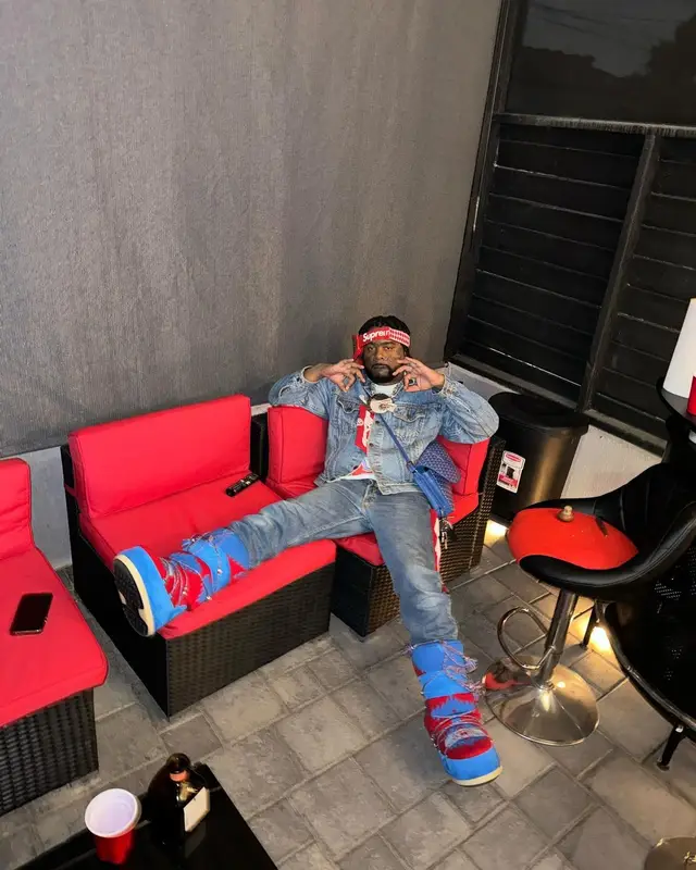03 Greedo outfit in Levi’s, Supreme, and Fox Racing, 2023