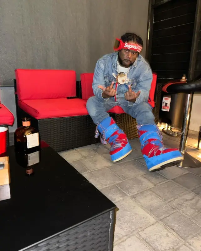 03 Greedo outfit in Levi’s, Supreme, and Fox Racing, 2023