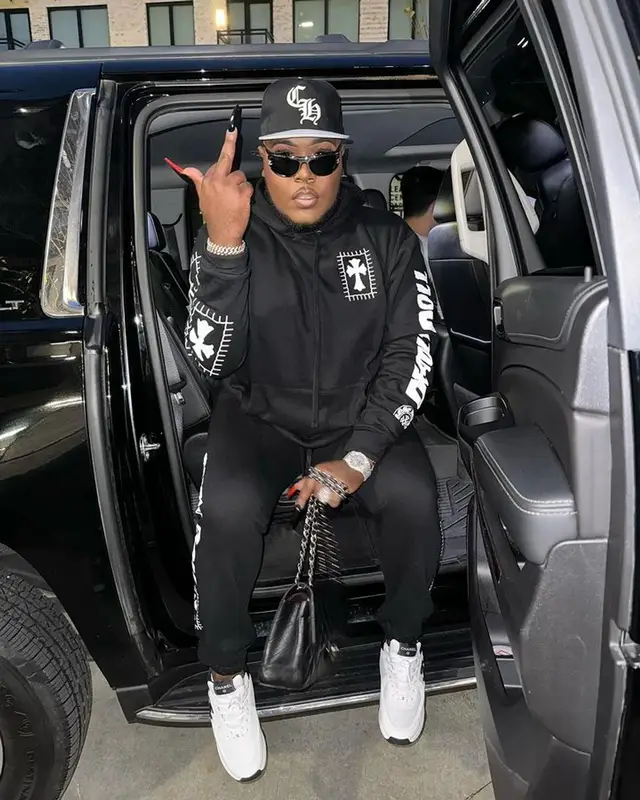 Saucy Santana outfit in Deadly Doll, Chanel, and Chrome Hearts, 2023