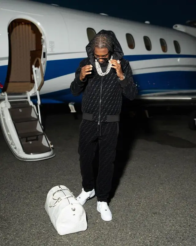 Lil Tjay outfit in Nike, Fendi, and Prada, 2023