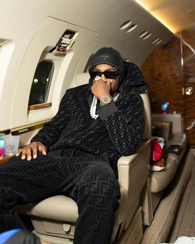 Lil Tjay outfit in Nike, Fendi, and Prada, 2023