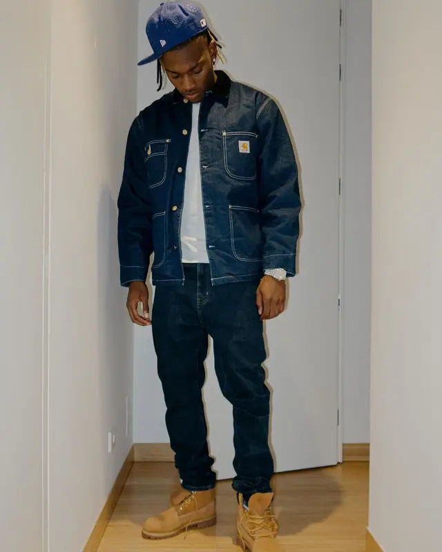 Rafael Leao outfit in Carhartt, Timberland, and New Era, 2023