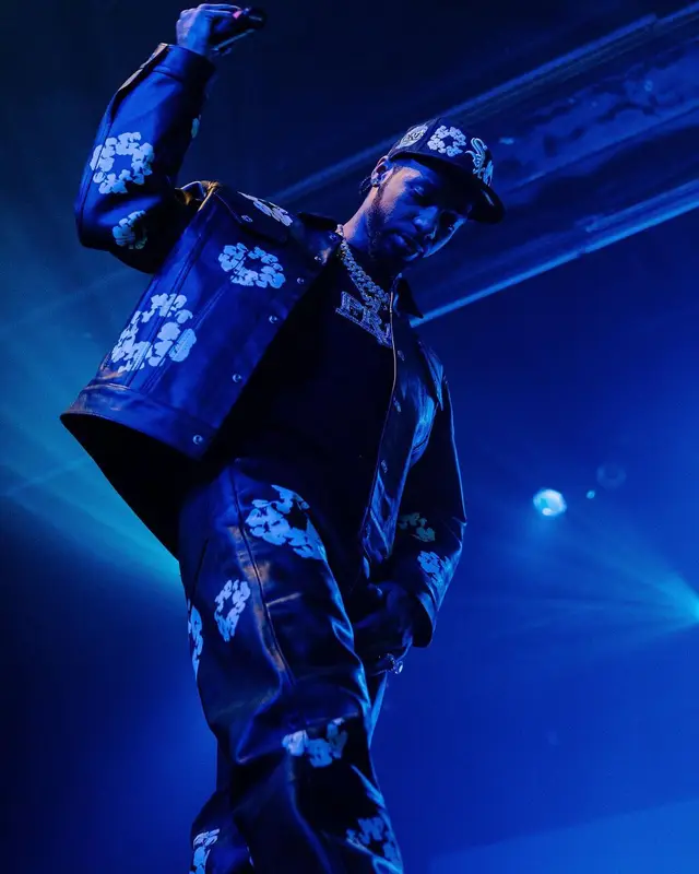 Key Glock outfit in Levi’s, Hanes, and Denim Tears, 2023