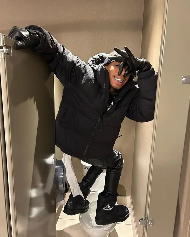 NLE Choppa outfit in Louis Vuitton, Purple Brand, and Celine, 2023