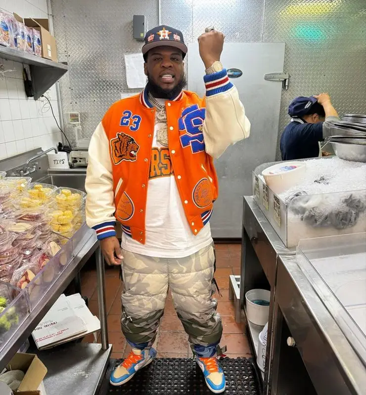 Maxo Kream outfit in Supreme, The North Face, and   Kaws, 2023