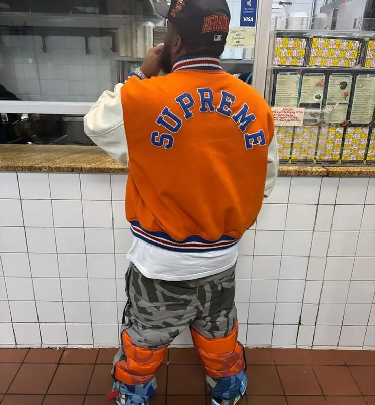 Maxo Kream outfit in Supreme, The North Face, and   Kaws, 2023