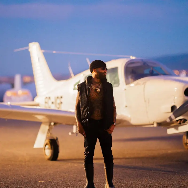 Arcangel outfit in Louis Vuitton, Amiri, and Prada, 2023