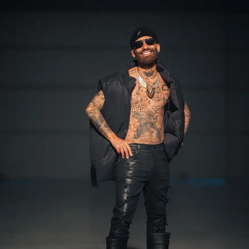 Arcangel outfit in Louis Vuitton, Amiri, and Prada, 2023