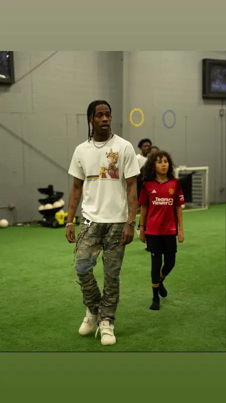Travis Scott outfit in Vintage, Undercover, and Oakley, 2023