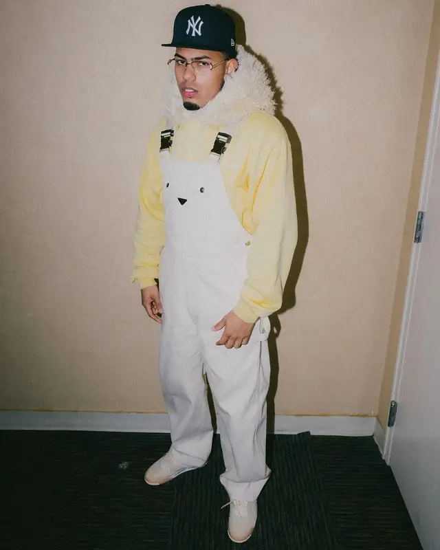 Myke Towers outfit in Prada, Marni, and New Era, 2023
