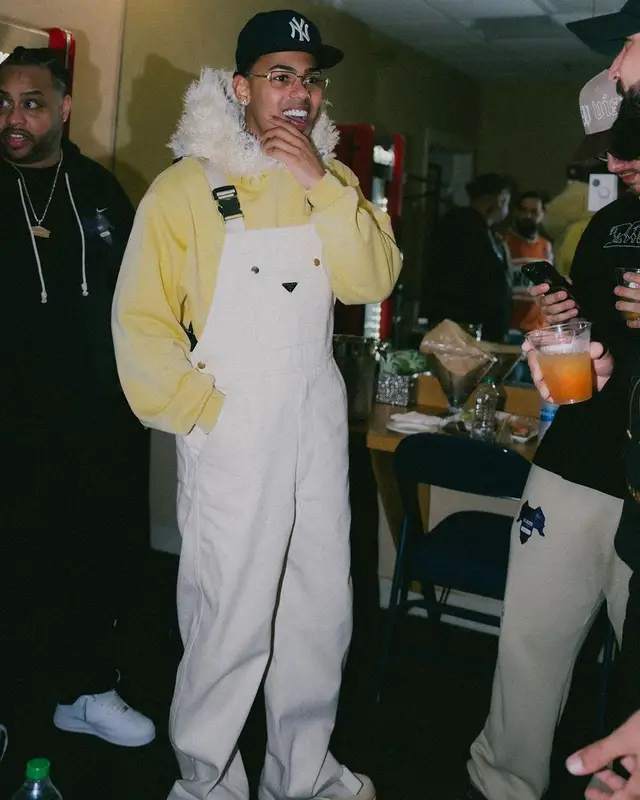 Myke Towers outfit in Prada, Marni, and New Era, 2023