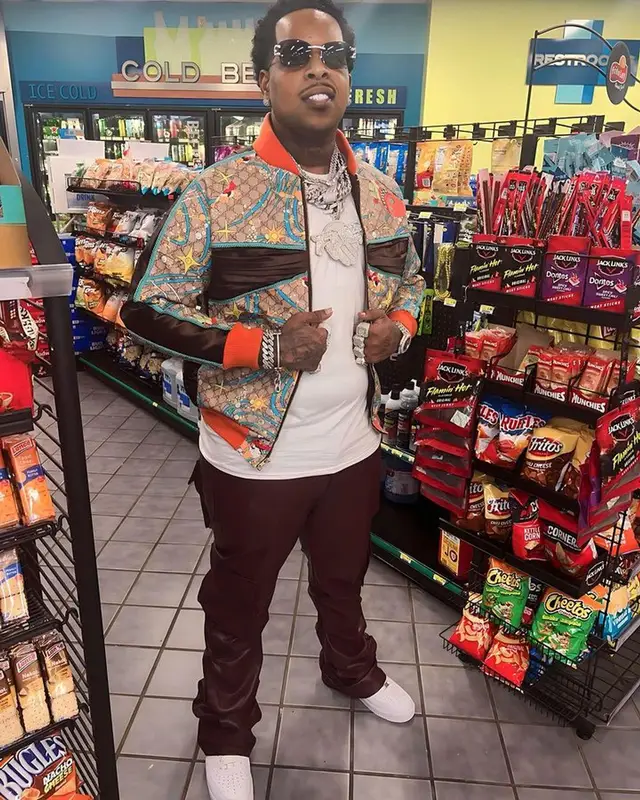 Finesse2tymes outfit in Hanes, Valabasas, and Nike, 2023