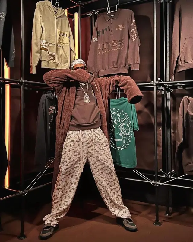 Travis Scott outfit in Cactus Jack, Nike, and Audemars Piguet, 2023