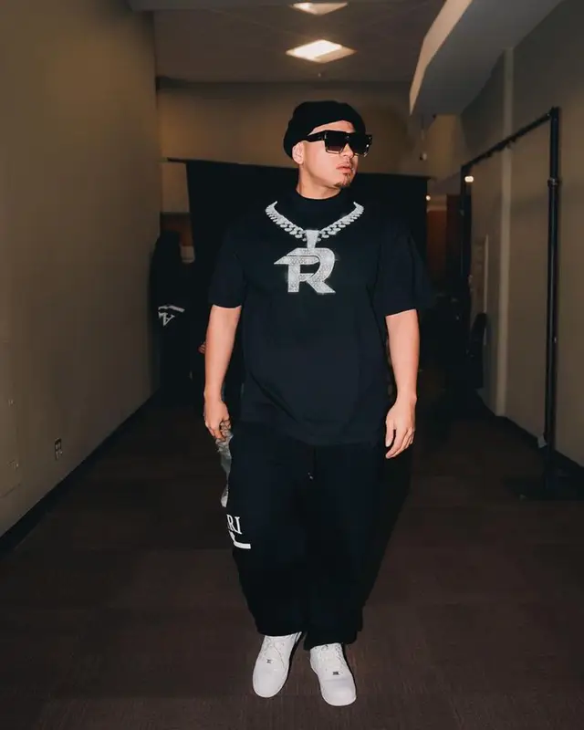 Fuerza Regida outfit in Amiri, Nike, and Louis Vuitton, 2023