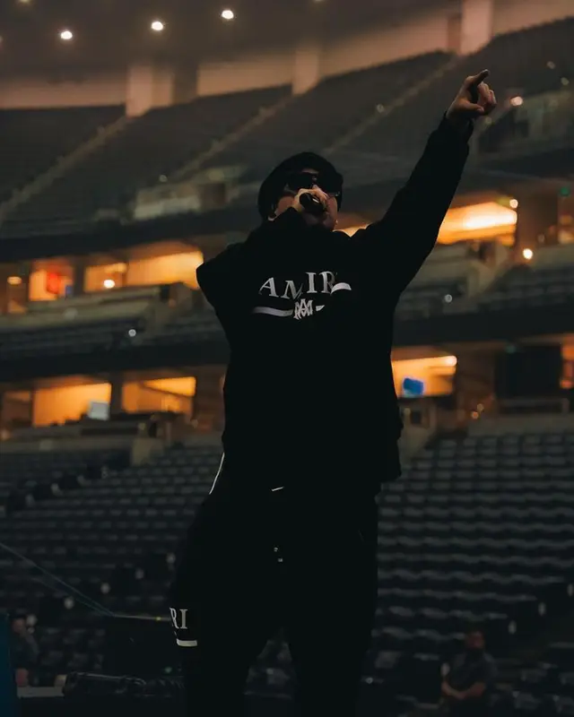 Fuerza Regida outfit in Amiri, Nike, and Louis Vuitton, 2023