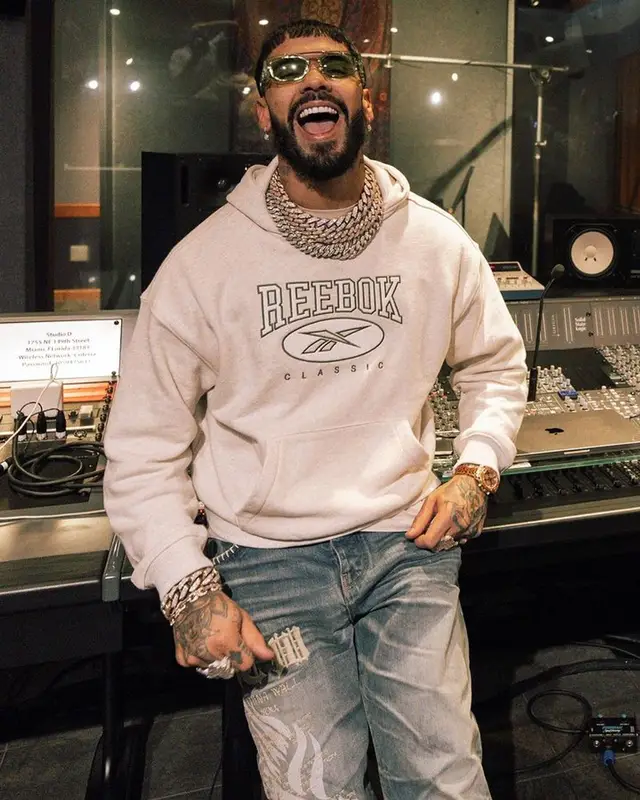 Anuel AA outfit in Reebok, Amiri, and Versace, 2023
