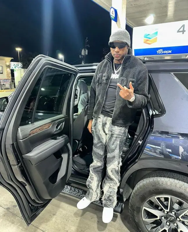 Rob49 outfit in Who Decides War, Nike, and Rick Owens, 2023