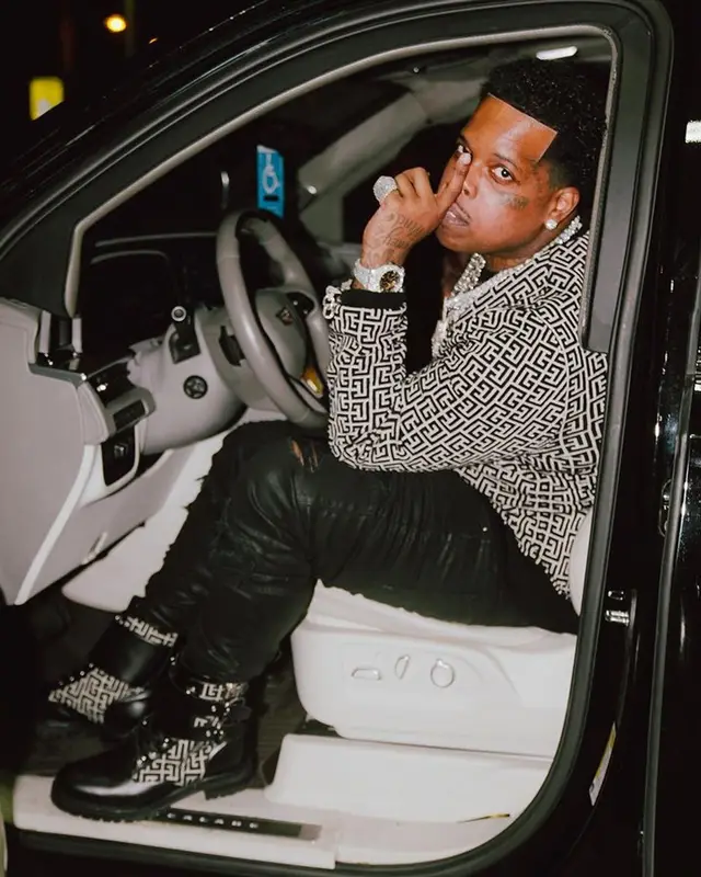 Finesse2tymes outfit in Balmain and Amiri, 2023