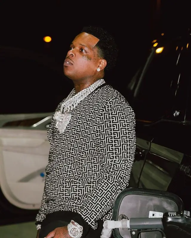 Finesse2tymes outfit in Balmain and Amiri, 2023