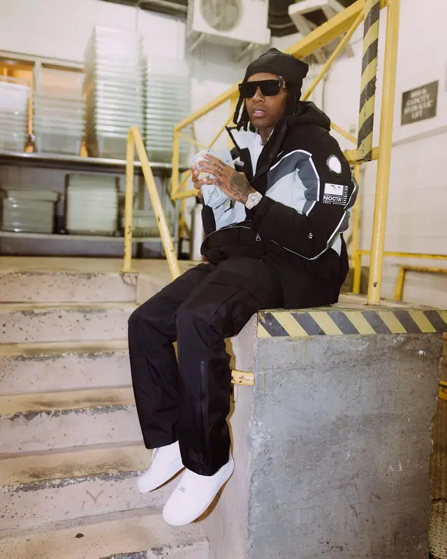 Lil Durk outfit in Nike, Louis Vuitton, and Nocta, 2023