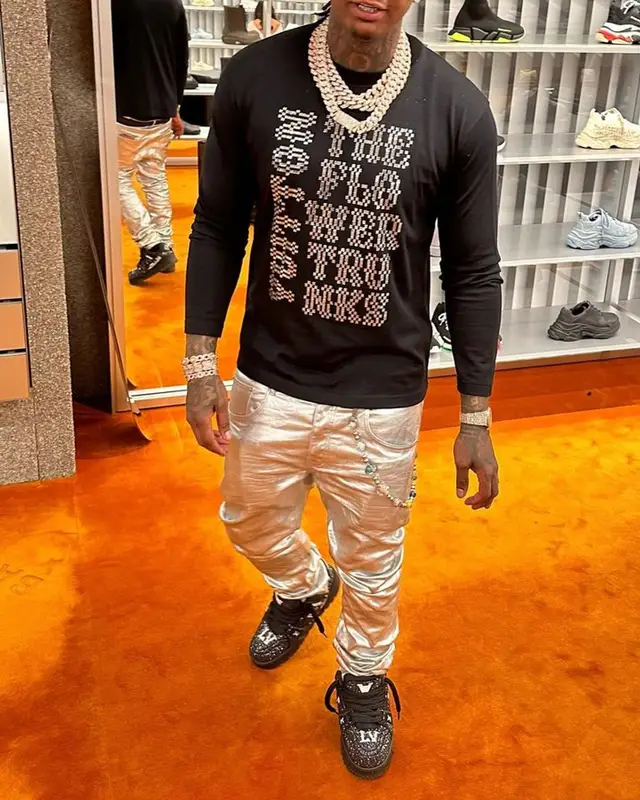 Moneybagg Yo outfit in Louis Vuitton and Purple Brand, 2023