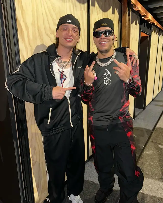 Peso Pluma outfit in Celine, Nike, and New Era, 2023