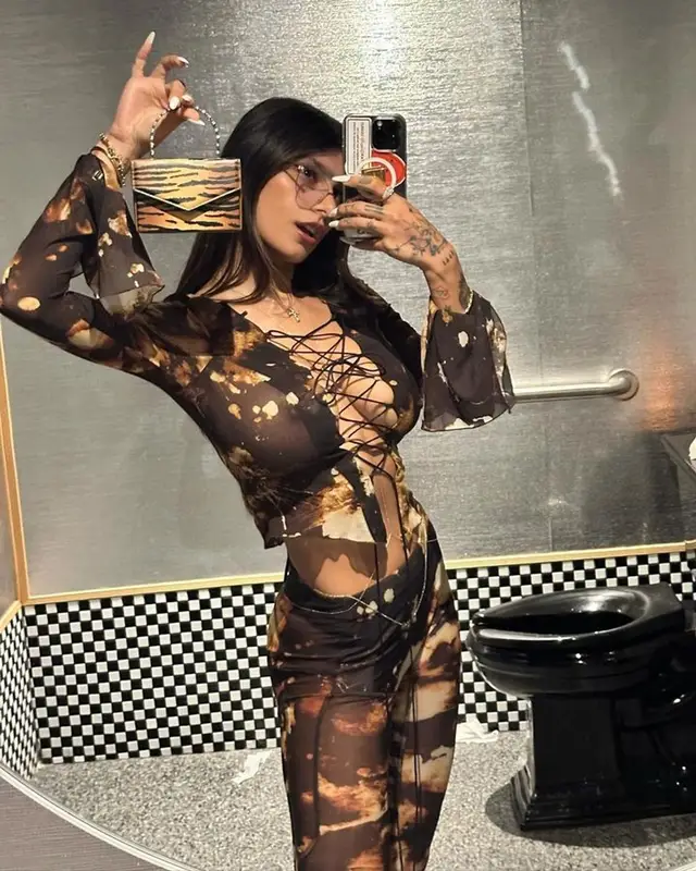 Mia Khalifa outfit in Knwls and Amina Muaddi, 2023