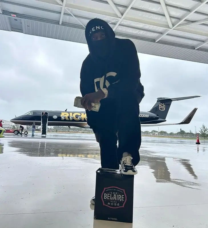 Rick Ross outfit in Dolce & Gabbana, Prada, and Givenchy, 2023