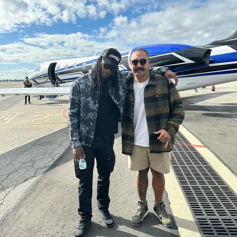 Davante Adams outfit in Dior, Givenchy, and Prada, 2023