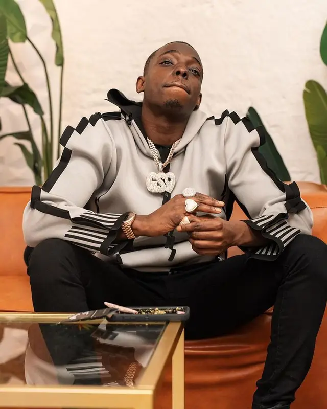 Bobby Shmurda outfit in Loewe, Amiri, and Jordan, 2023