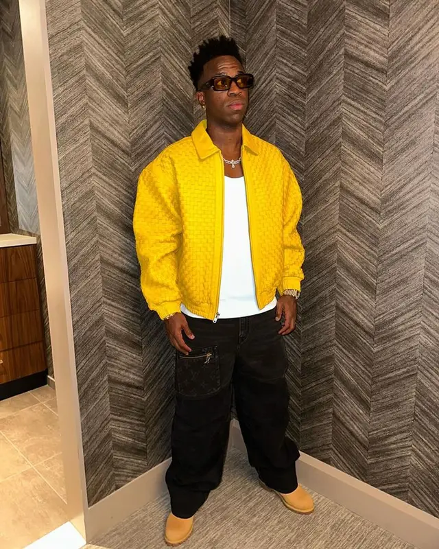 Vinicius Jr outfit in Supreme, Louis Vuitton, and Timberland, 2023