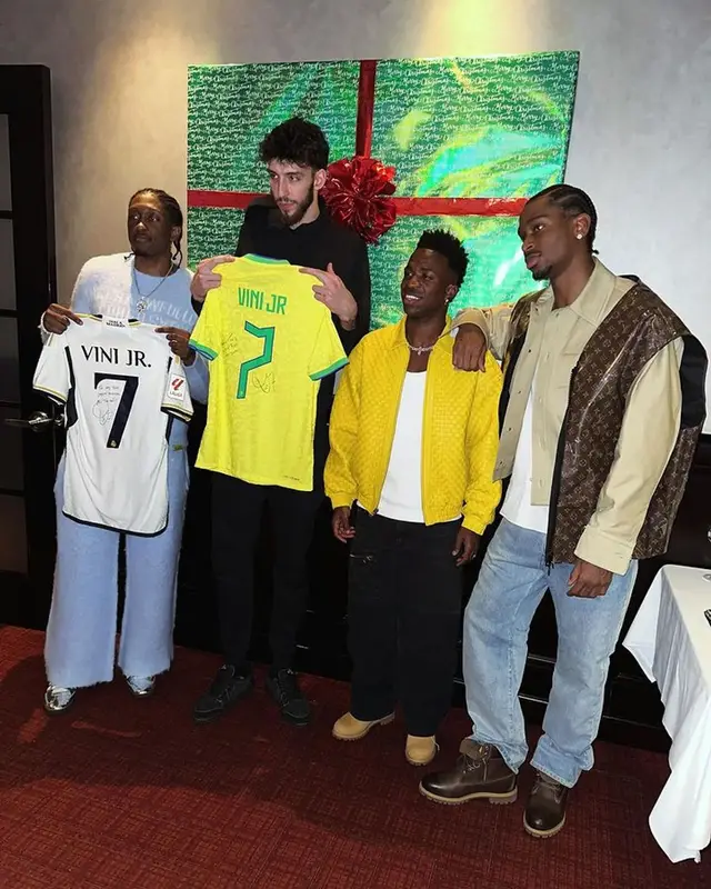Vinicius Jr outfit in Supreme, Louis Vuitton, and Timberland, 2023