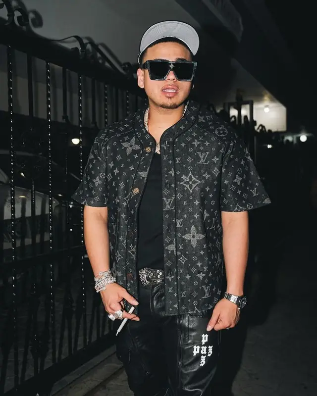 Jesus Ortiz Paz outfit in B.B. Simon, Louis Vuitton, and New Era, 2023
