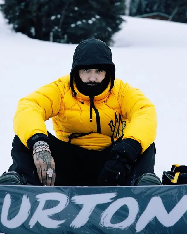 Anuel AA outfit in Moncler and Amiri, 2023