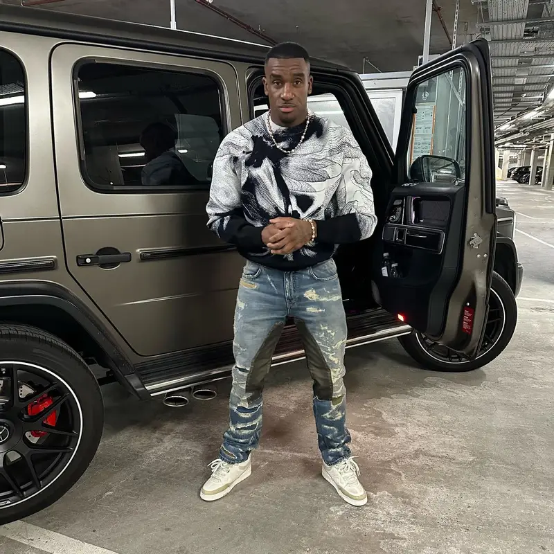Bugzy Malone outfit in Alexander McQueen, Givenchy, and Louis Vuitton, 2023
